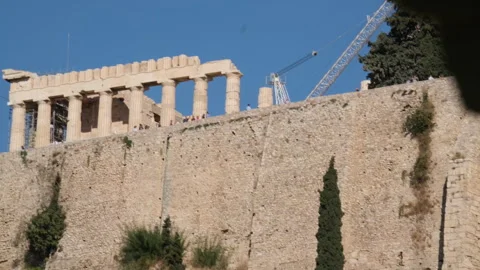 Athens with Acropolis hill on a hot summer day in Greece. Travel image of a Stock Footage 303857773