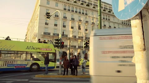 Athens downtown traffic intersection buildings people pedestrians crossing Stock Footage 46014770