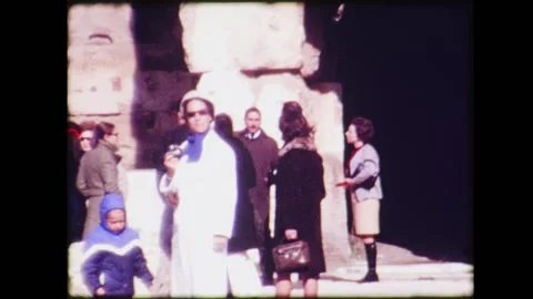 Athens, Greece - 1968 circa: group of visitors inside the ruins of the Parthe 스톡 동영상 170498060