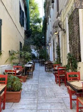 Athens Greece Alley Tables and Chairs Stock Photos