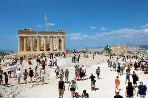 ATHENS, GREECE- JULY 18, 2018: The ancient ruins of Parthenon and Erechtheion Stock Photos