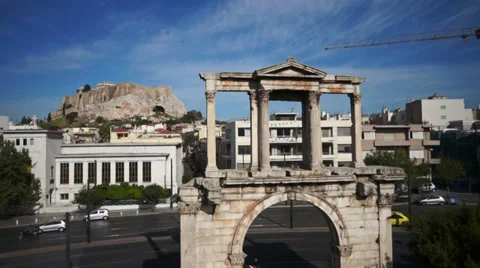 Athens low flight Roman Gate and the Acropolis Rock Stock Footage 30851976