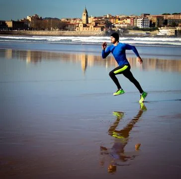 Athlete on beach Foto stock