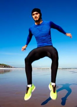 Athlete on beach Stock Photos