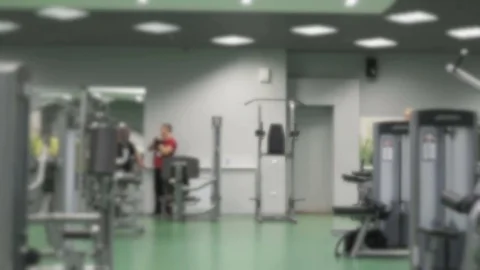 Athlete blonde engaged in the gym Stock Footage 80984915