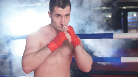 Athlete boxer man in ring Stock Footage 121963622