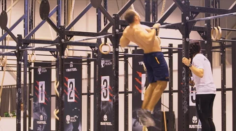 Athlete is catching up on a horizontal bar Stock Footage 58031839