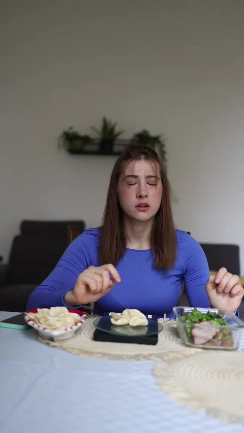Athlete chooses between chips and healthy meal Stock Footage 339854930