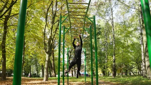 The athlete climbs the ladder Stock Footage 229728707