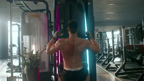 Athlete do pullup workout in sport gym, back view. Stock Footage 239553558