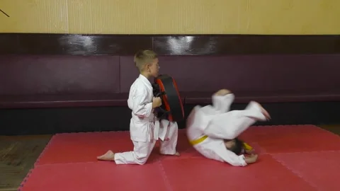 The athlete does a somersault and hit on the simulator Stock Footage 157069816