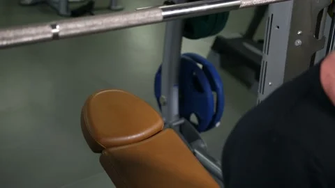 Athlete doing barbell exercises 4K Slow Mo Video stock 100259497