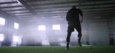 Athlete doing exercise on agility ladder in fitness studio 動画素材 78203333