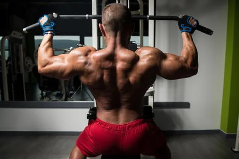 Athlete Doing Heavy Weight Exercise For Back Stock Photos