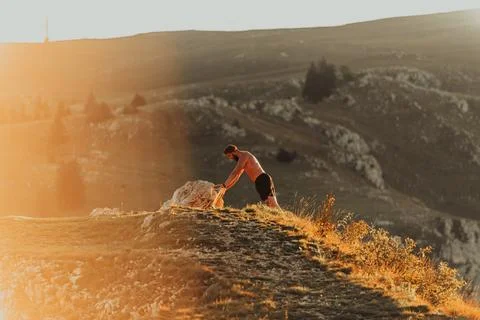 Athlete doing push-ups in the early morning. The concept of a healthy life Stock Photos