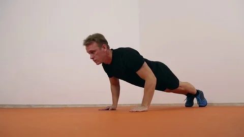 Athlete doing pushups Stock Footage 70562878