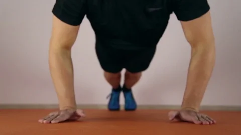 Athlete doing pushups Stock Footage 70563439