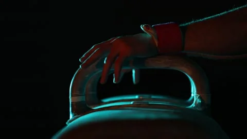 The athlete is doing rotations on the parallel bars 2 Stock-Footage 310636832