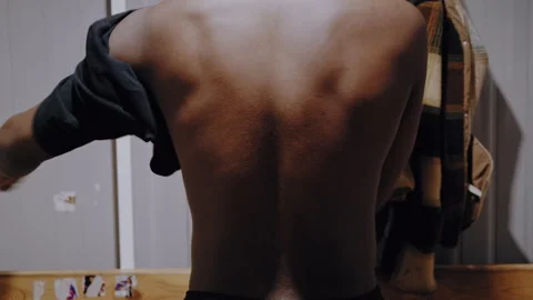 Athlete Dressing in Locker Room Pre-Game 库存影片 306779132