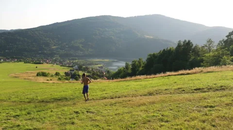 Athlete during intense running workout in mountains Stock Footage 55866256