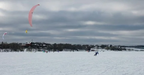 The athlete is engaged in Snowkiting Stock Footage 72638355