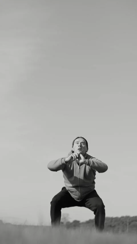 An Athlete Engaged in Training Outdoors Captured in Striking Black and White Stock Footage 303488008