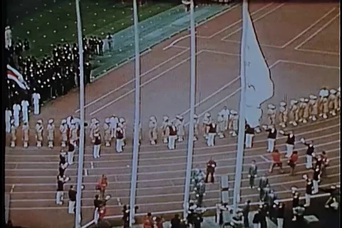Athlete holding torch and igniting the Olympic Flame - 1980 Stock Footage 105509036