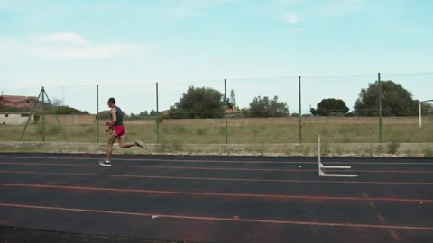 Athlete Jumping Obstacles In The Race Track Stock Footage 282009624