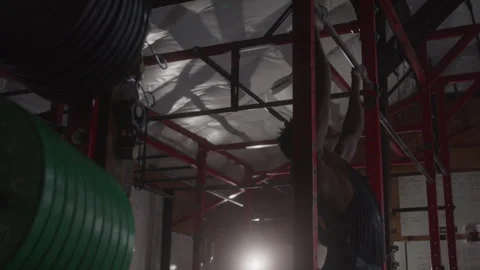 Athlete Jumps Up To Bar To Do Pull Ups In Gym Stock Footage 270324279