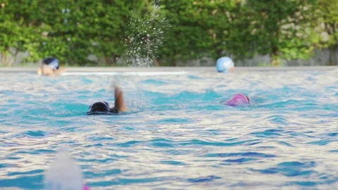 Athlete kid practice swimming in the pool, slow motion footage Stock Footage 91644590