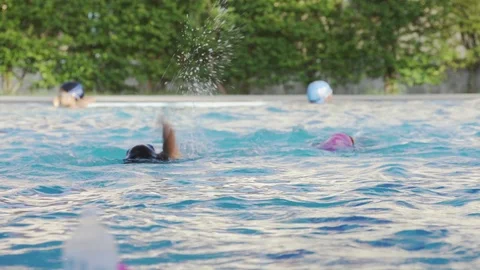Athlete kid practice swimming in the pool, slow motion footage Stock Footage 91645402