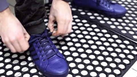 Athlete laces shoes before exercise 스톡 동영상 83584240