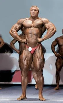 Athlete in lat spread pose. Stock Photos