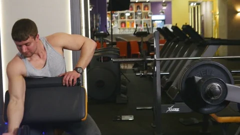 Athlete is Lifting Dumbbell Stock Footage 75349492