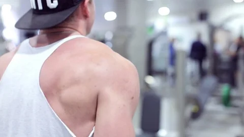 Athlete makes biceps exercises with a barbell Stock Footage 83819787