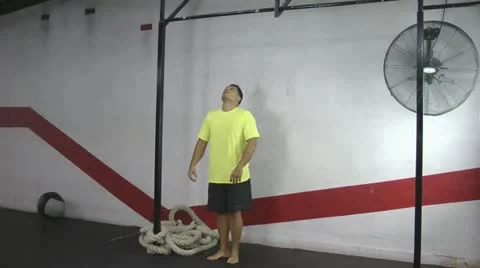 Athlete making strict pull ups crossfit exercise Stock Footage 22330274