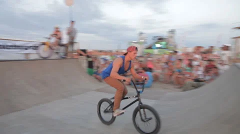 Athlete Making Tricks on A BMX Bicycle on a Ramp during the competition. Stock Footage 59896090