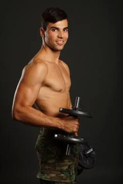 Athlete man exercises Stock Photos