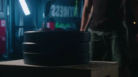 Athlete man performs high jumps in the gym Stock Footage 130357153