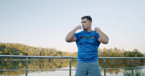 An athlete passionately demonstrating an engaging workout routine by the Stock Footage 318072775