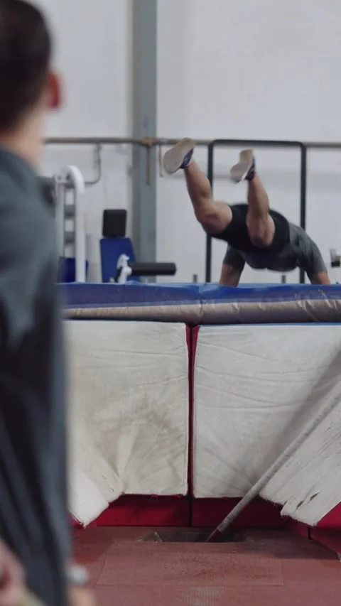 Athlete performing a backflip during pole vault training Stock-Footage 330460354