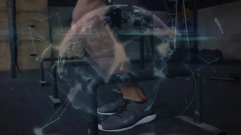 Athlete performing hops on low bars for fitness, causing globe overlay growing Stock Footage 330959185