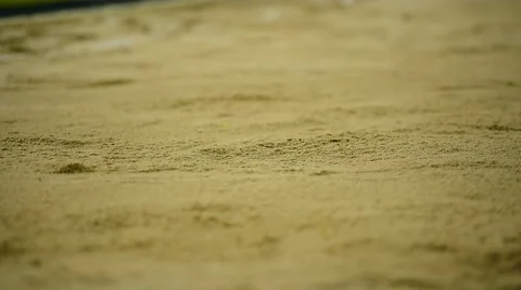 Athlete performing a long jump Vídeo Stock 62522900