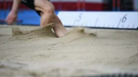 Athlete performing a long jump 스톡 동영상 62522931