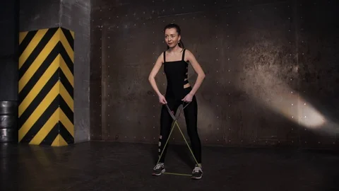 Athlete performs exercises from the group program with dumbbells. Stock Footage 104721007