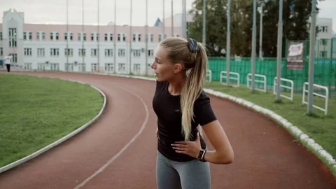 The athlete performs inclinations in different directions Video stock 80981532