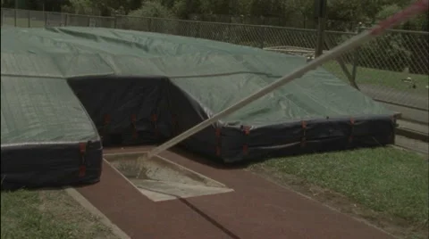 An athlete performs a pole vault. Stock Footage
