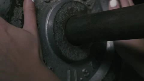 Athlete Placing Weight Plates On Barbell Close Up Stock Footage