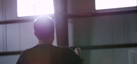 Athlete practicing to accurately throw the ball towards the goal post Stock Footage 77331840