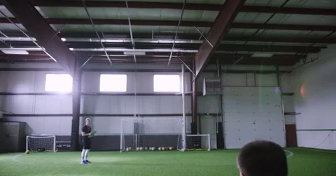 Athlete practicing to throw the ball at a distance 動画素材 77484818